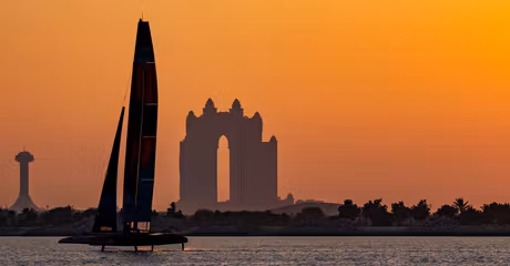 NORTHSTAR SailGP Team helmed by Giles Scott sail past the Atlantis during a practice session at sunset ahead of the Mubadala Abu Dhabi Sail Grand Prix 2025 Season Grand Final presented by Abu Dhabi Sports Council held in Abu Dhabi, United Arab Emirates, Thursday 27 November 2025