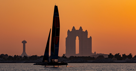 NORTHSTAR SailGP Team helmed by Giles Scott sail past the Atlantis during a practice session at sunset ahead of the Mubadala Abu Dhabi Sail Grand Prix 2025 Season Grand Final presented by Abu Dhabi Sports Council held in Abu Dhabi, United Arab Emirates, Thursday 27 November 2025