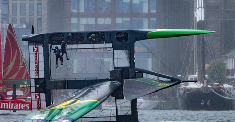 Australia SailGP Team helmed by Tom Slingsby capsize during the second race as Emirates Great Britain SailGP Team helmed by Giles Scott sail past on Race Day 2 of the ROCKWOOL Canada Sail Grand Prix in Halifax, Canada. Sunday 2nd June 2024