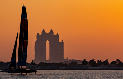 NORTHSTAR SailGP Team helmed by Giles Scott sail past the Atlantis during a practice session at sunset ahead of the Mubadala Abu Dhabi Sail Grand Prix 2025 Season Grand Final presented by Abu Dhabi Sports Council held in Abu Dhabi, United Arab Emirates, Thursday 27 November 2025