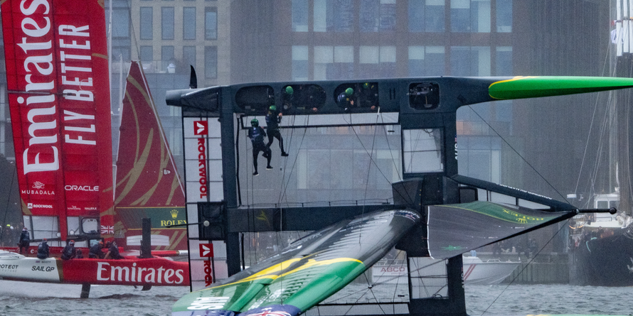 Australia SailGP Team helmed by Tom Slingsby capsize during the second race as Emirates Great Britain SailGP Team helmed by Giles Scott sail past on Race Day 2 of the ROCKWOOL Canada Sail Grand Prix in Halifax, Canada. Sunday 2nd June 2024