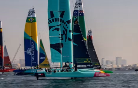 The USA SailGP Team helmed by Taylor Canfield sail amongst the fleet during a practice session ahead of the Emirates Dubai Sail Grand Prix presented by P&O Marinas in Dubai, UAE. Thursday 21 November 2024