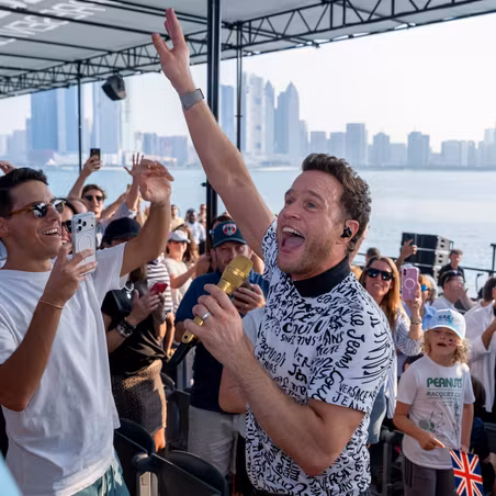 Olly Murs performs in front of the grandstand on Race Day 1 of the Mubadala Abu Dhabi Sail Grand Prix 2025 