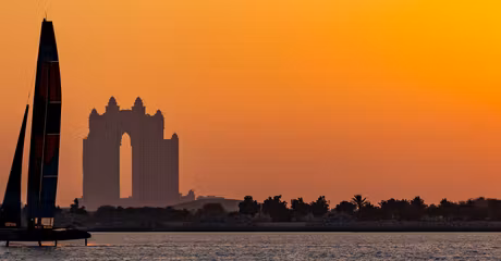 NORTHSTAR SailGP Team helmed by Giles Scott sail past the Atlantis during a practice session at sunset ahead of the Mubadala Abu Dhabi Sail Grand Prix 2025 Season Grand Final presented by Abu Dhabi Sports Council held in Abu Dhabi, United Arab Emirates, Thursday 27 November 2025
