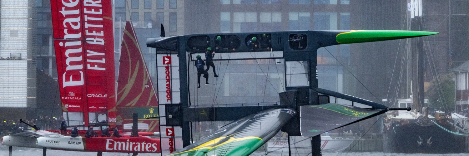 Australia SailGP Team helmed by Tom Slingsby capsize during the second race as Emirates Great Britain SailGP Team helmed by Giles Scott sail past on Race Day 2 of the ROCKWOOL Canada Sail Grand Prix in Halifax, Canada. Sunday 2nd June 2024