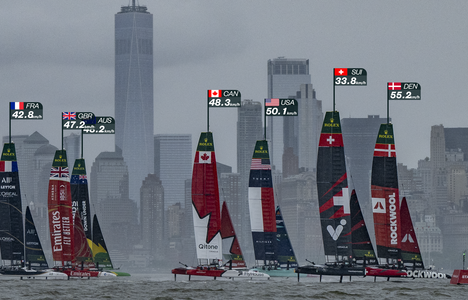ROCKWOOL Denmark SailGP Team helmed by Nicolai Sehested and Switzerland SailGP Team helmed by Sebastien Schneiter lead the fleet past the One World Trade Centre and New York City skyline on Race Day 1 of the Mubadala New York Sail Grand Prix in New York, USA. Saturday 7 June 2025
